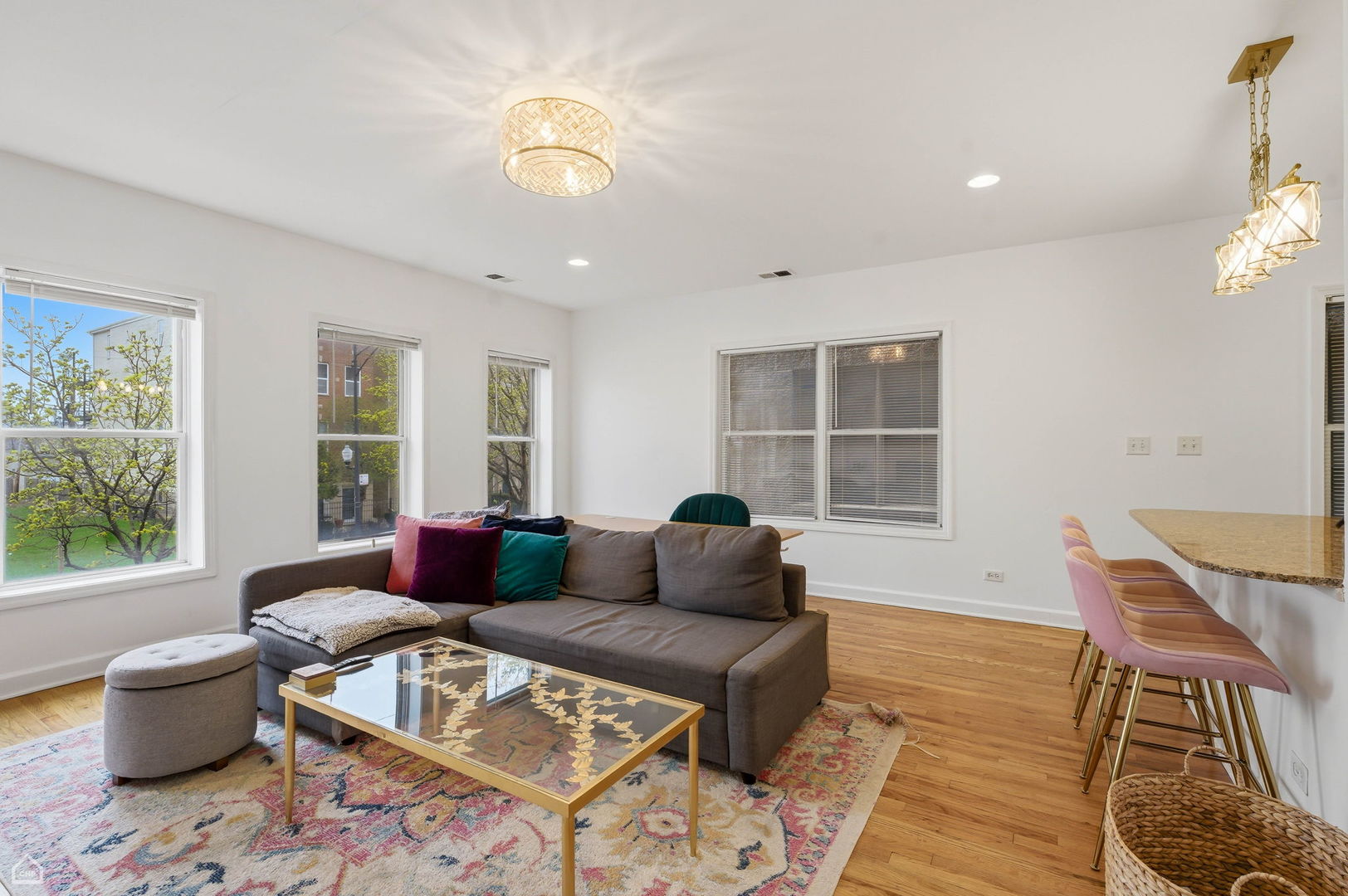 2455 West Harrison Street, Unit 2 Chicago, IL 60612 - Photo 4 of 20 a living room with furniture and a window