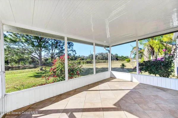 a view of an outdoor space with a large window