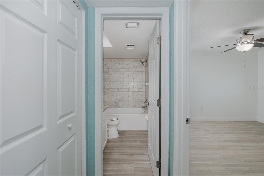 8150 Brent Street, Unit 742 Port Richey, FL 34668 - Photo 20 of 51 a bathroom view with a glass door shower