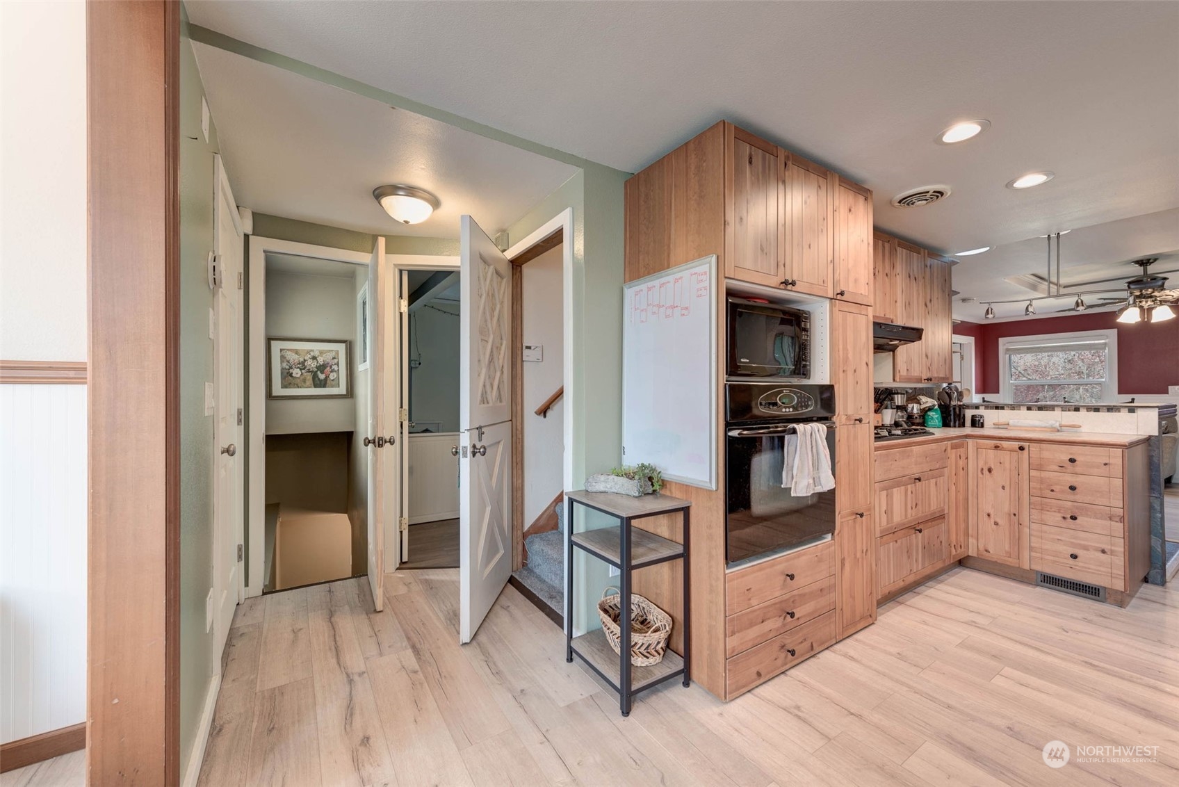 1709 Rainier Avenue Everett, WA 98201 - Photo 11 of 33 a kitchen with white cabinets and appliances