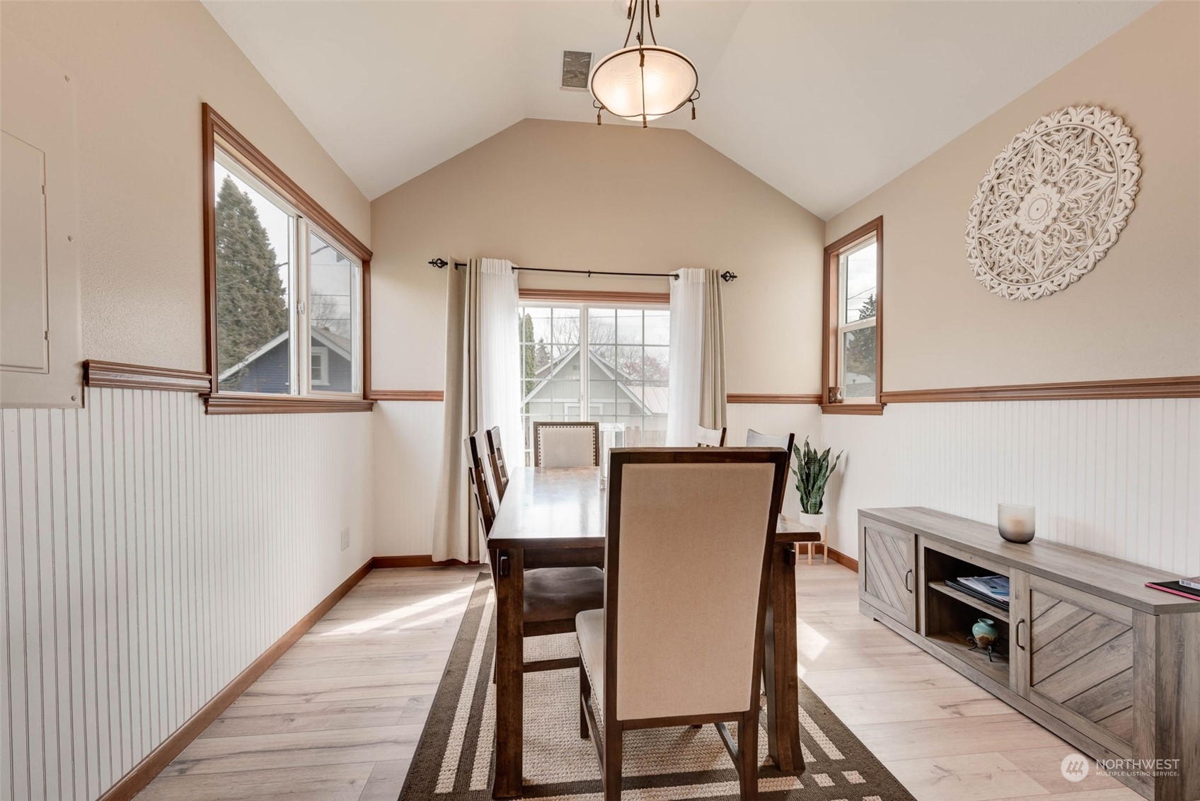 1709 Rainier Avenue Everett, WA 98201 - Photo 12 of 33 a view of a dining room with furniture window and wooden floor