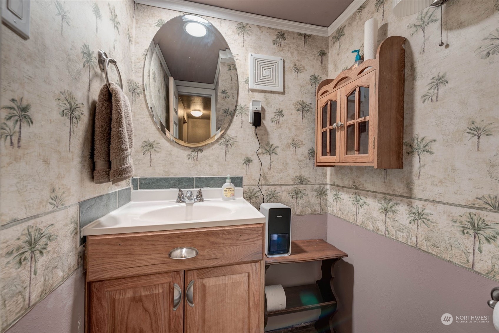1709 Rainier Avenue Everett, WA 98201 - Photo 24 of 33 a bathroom with a sink and a mirror