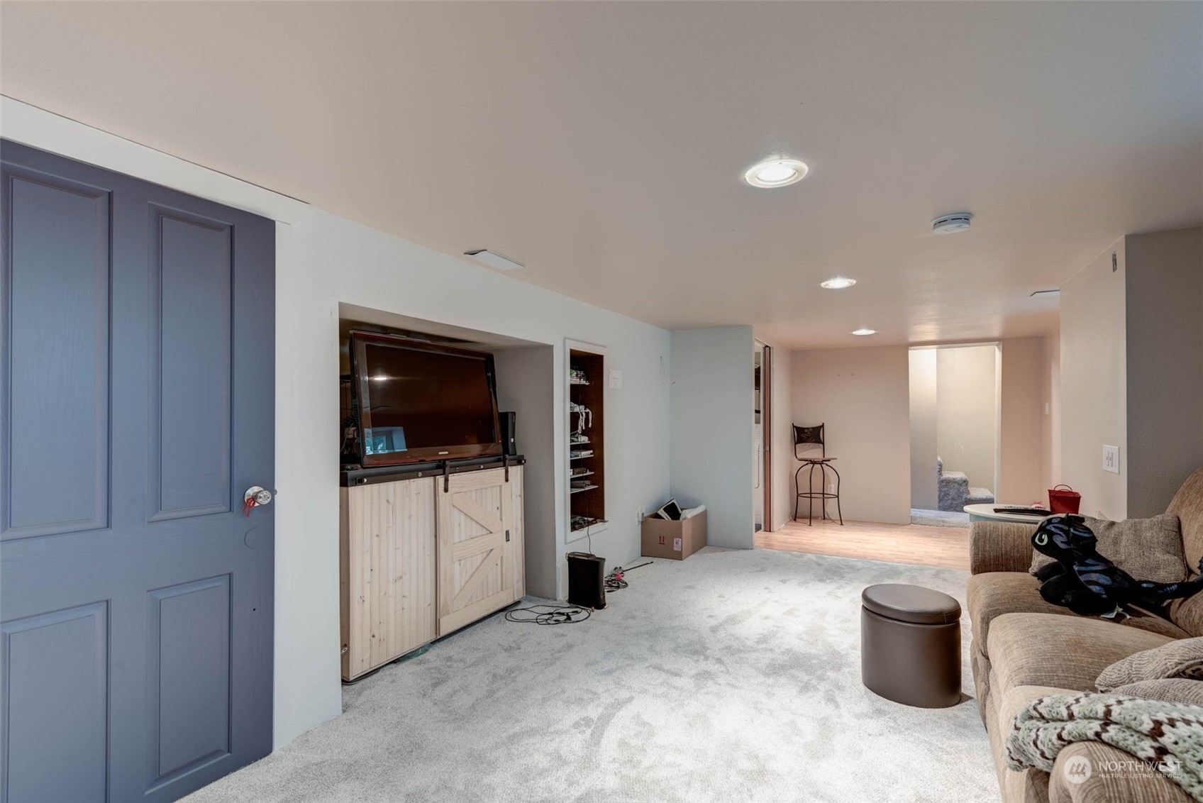 1709 Rainier Avenue Everett, WA 98201 - Photo 27 of 33 a living room with furniture and a flat screen tv