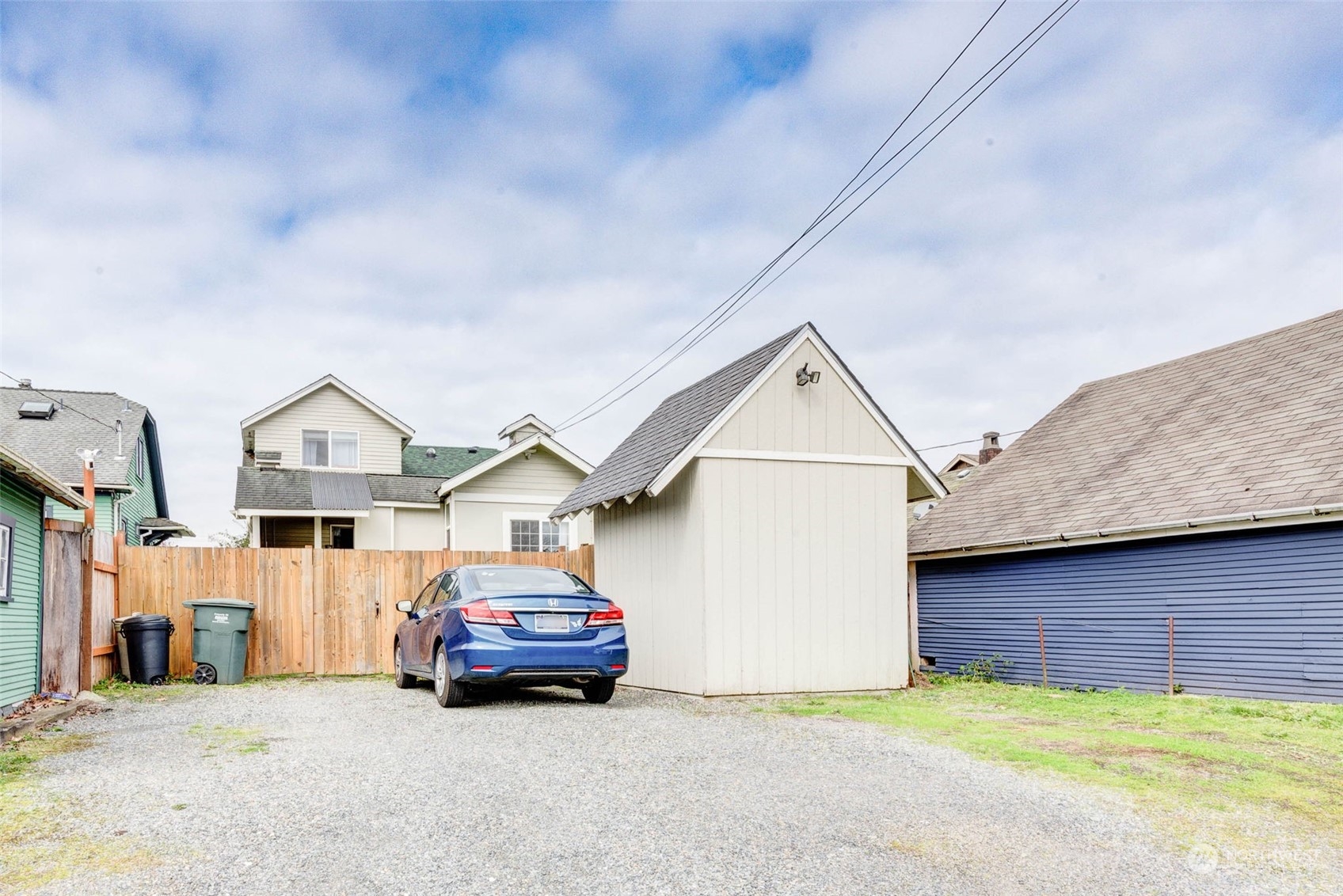 1709 Rainier Avenue Everett, WA 98201 - Photo 28 of 33 a car parked in front of a house