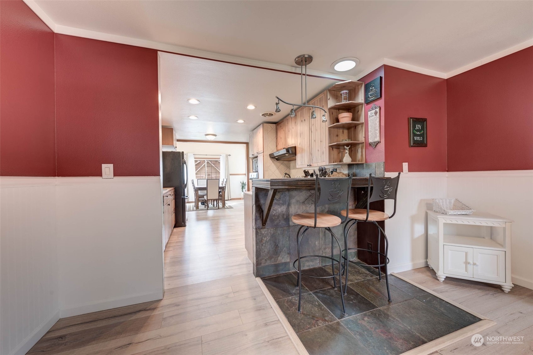 1709 Rainier Avenue Everett, WA 98201 - Photo 8 of 33 a lobby with furniture and a dining table with wooden floor