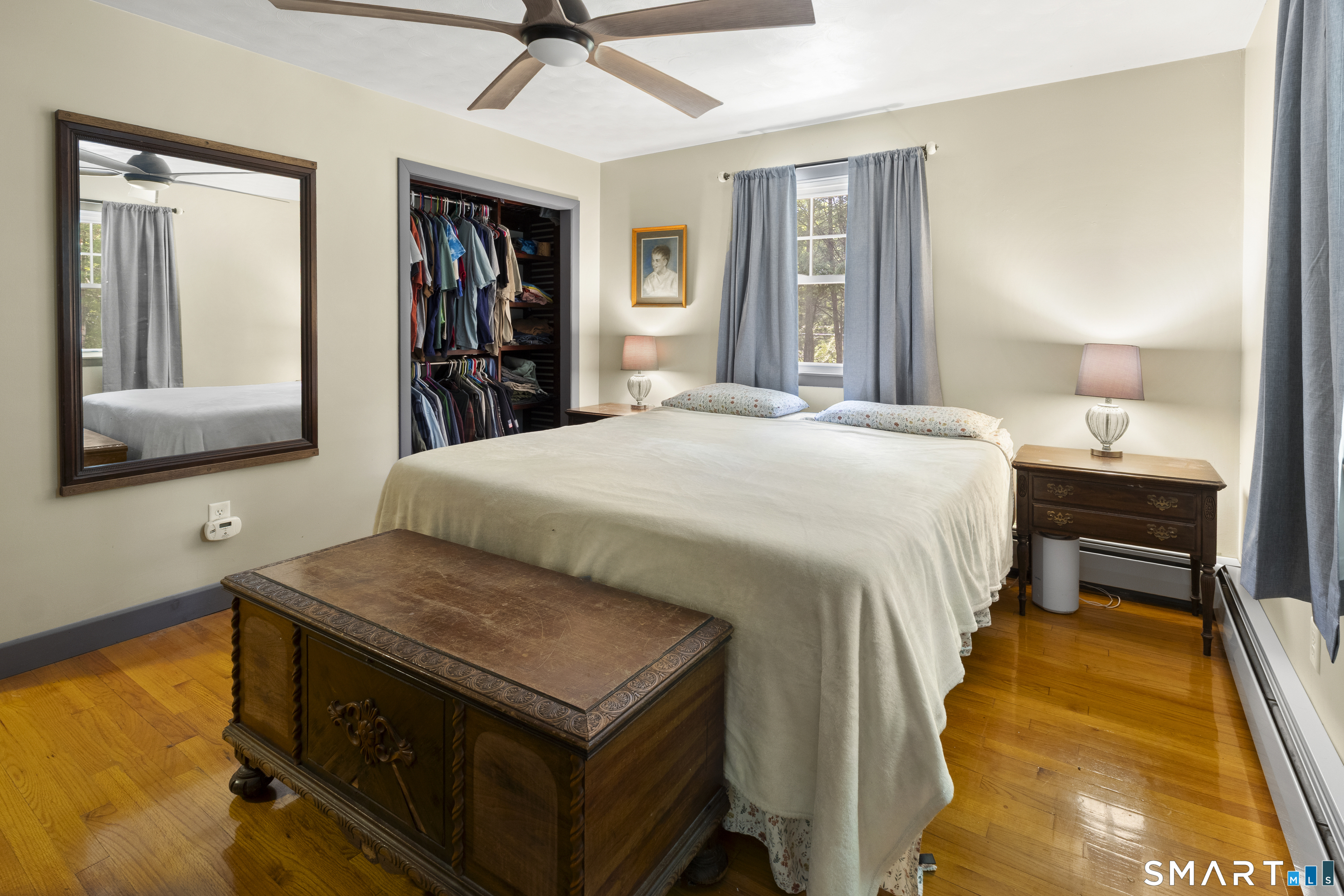 11 Munyan Road Putnam, CT 06260 - Photo 15 of 33 a bedroom with a bed and a dresser