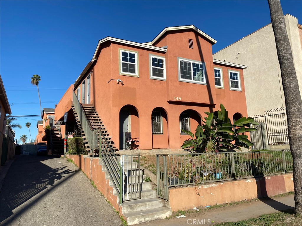 149 North Alexandria Avenue Los Angeles, CA 90004 - Photo 1 of 9 a front view of house with street