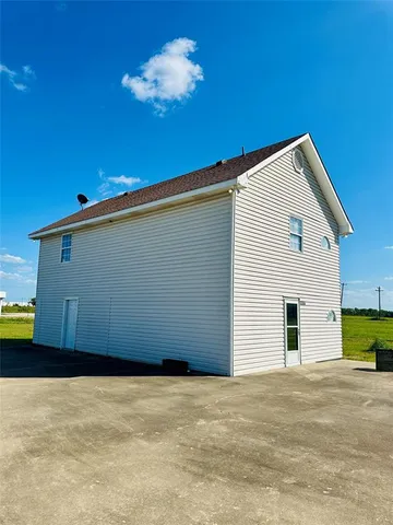 a view of a house with a garage