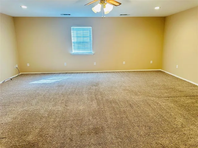 an empty room with a natural light