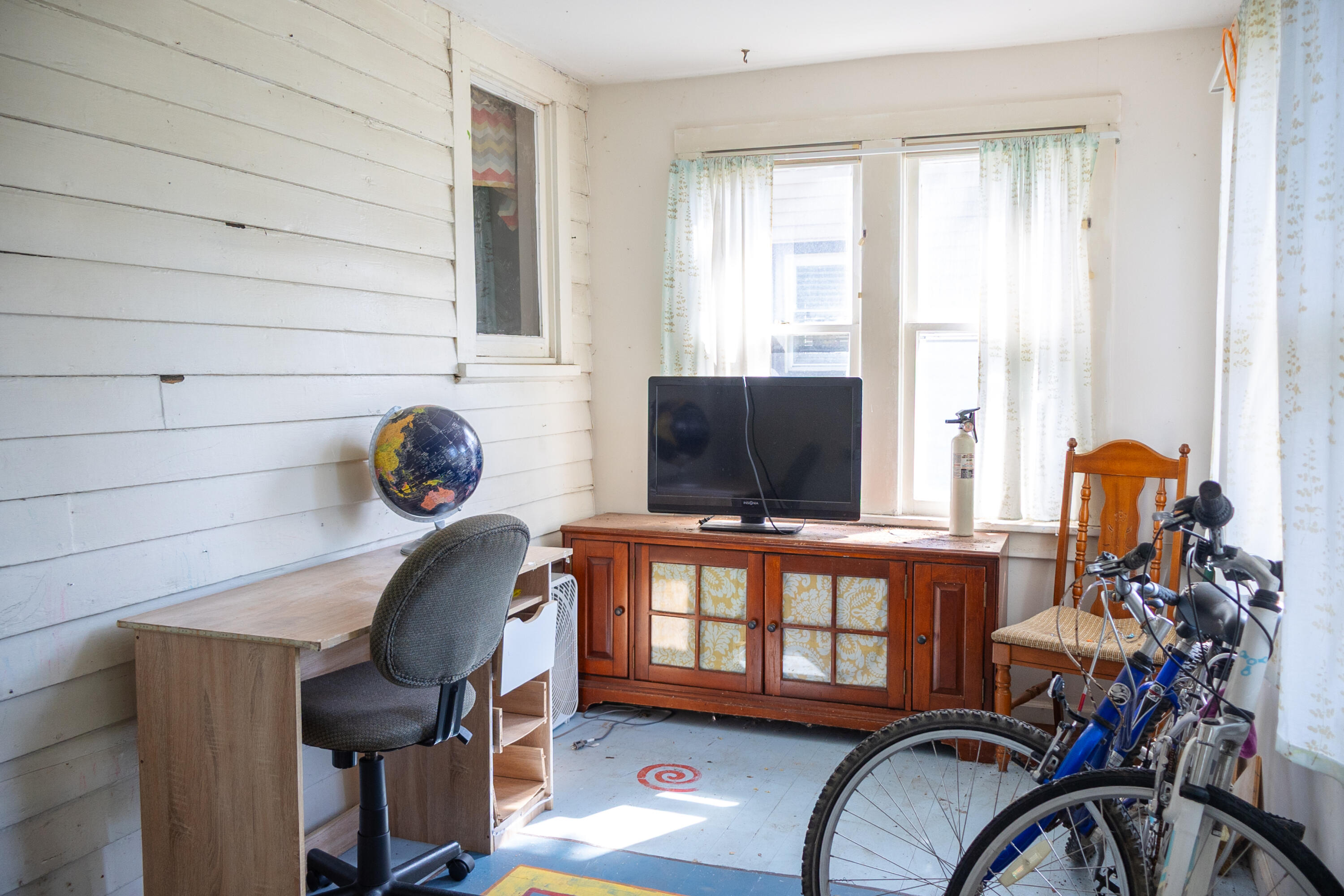 334 Franklin Street Chesterton, IN 46304 - Photo 10 of 20 a view of a workspace with furniture and a window