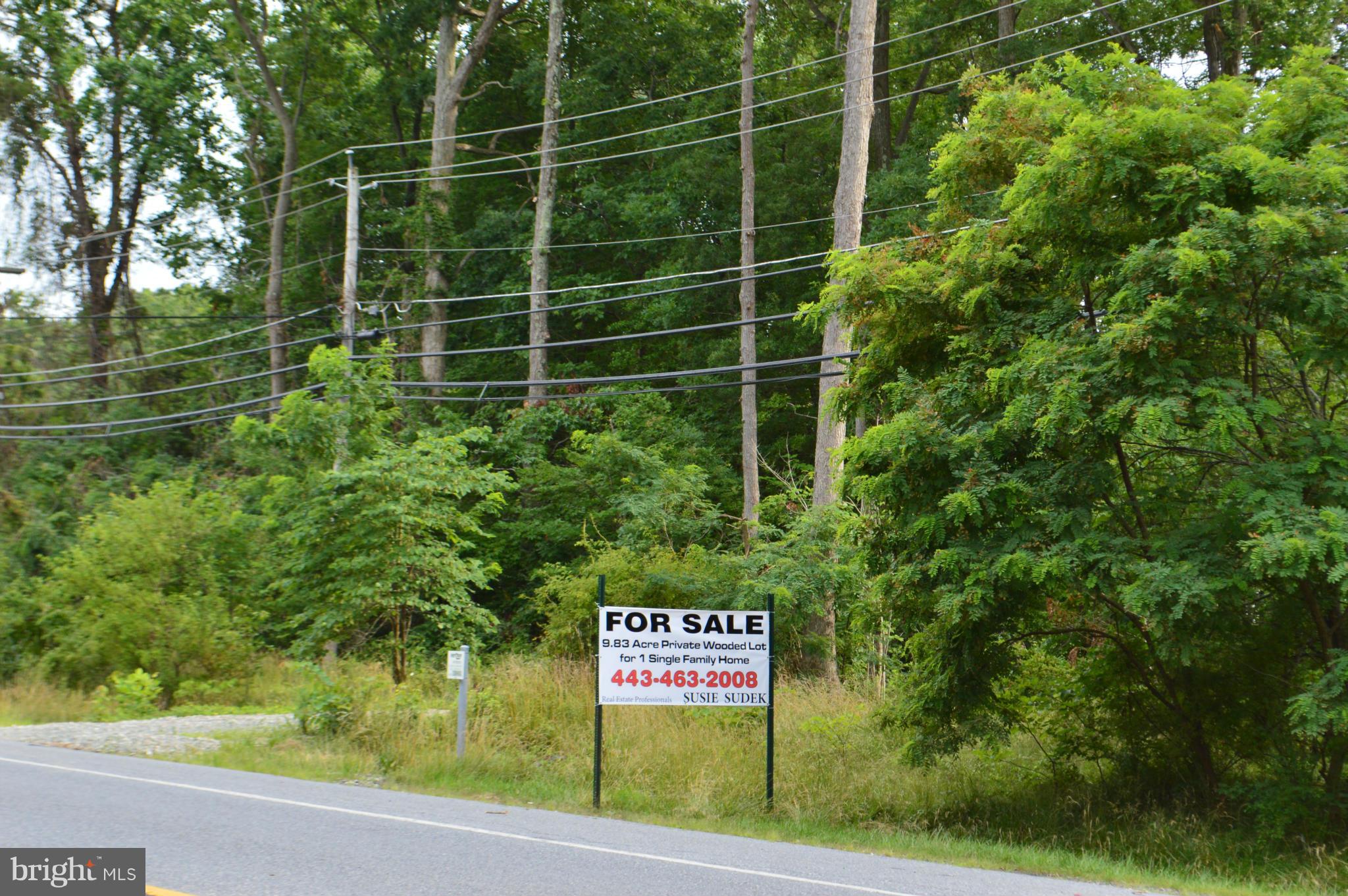 730 Back River Neck Road Baltimore, MD 21221 - Photo 1 of 7 a sign that is on the side of a road