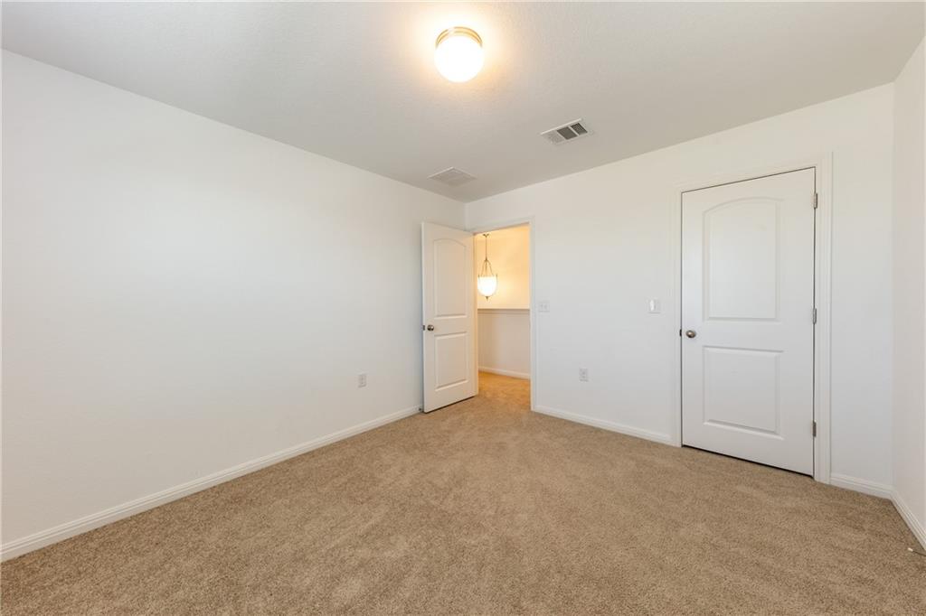 6708 Routenburn Street Austin, TX 78754 - Photo 13 of 21 a view of an empty room and window