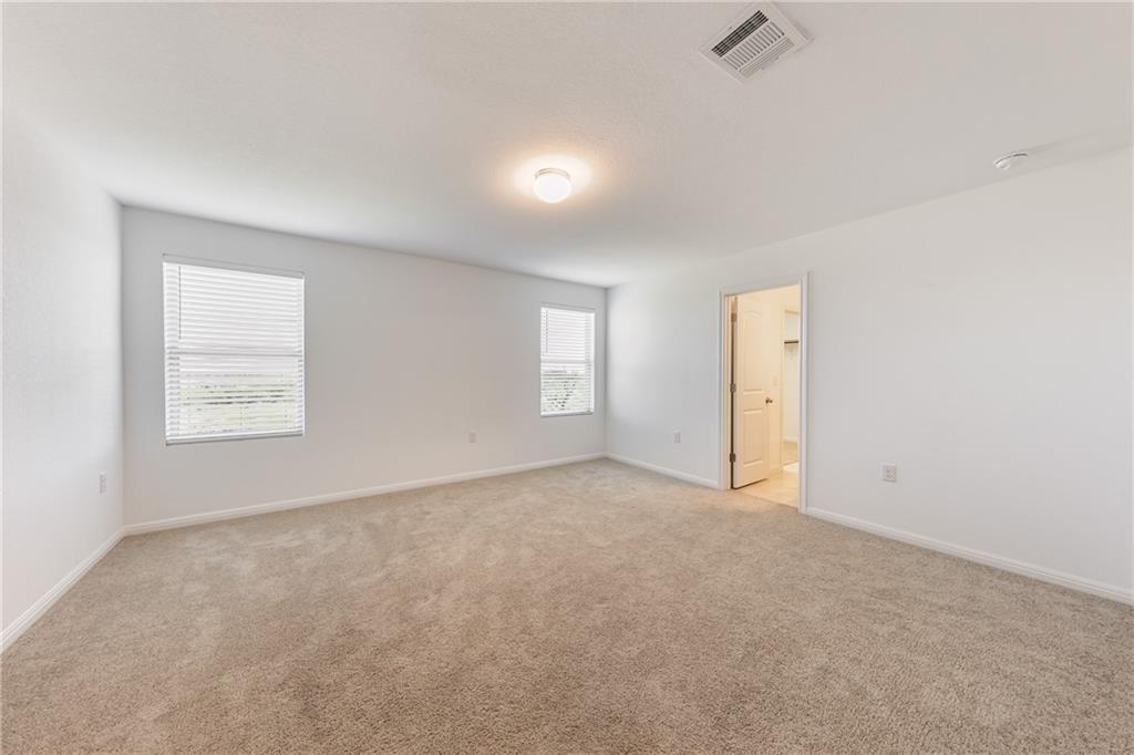 6708 Routenburn Street Austin, TX 78754 - Photo 14 of 21 an empty room with windows