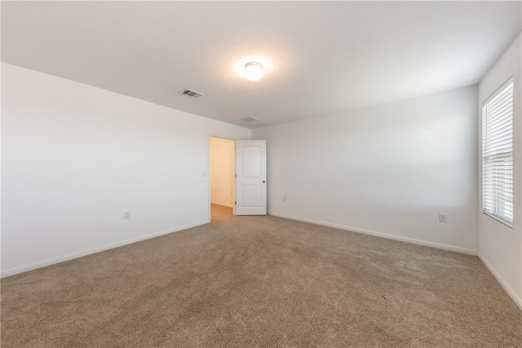 6708 Routenburn Street Austin, TX 78754 - Photo 15 of 21 an empty room with windows