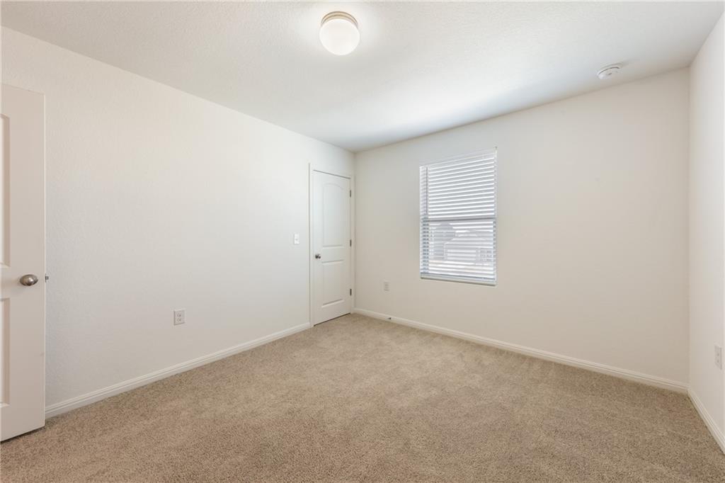 6708 Routenburn Street Austin, TX 78754 - Photo 8 of 21 an empty room with a empty space and window