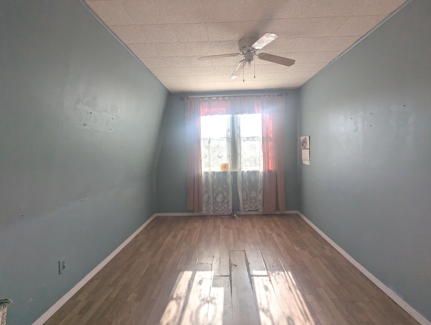 5708 West 84th Place Burbank, IL 60459 - Photo 7 of 15 wooden floor in an empty room with a window