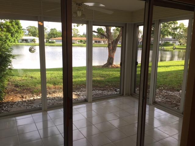 5400 Poppy Place, Unit B Delray Beach, FL 33484 - Photo 14 of 27 Lake view from patio