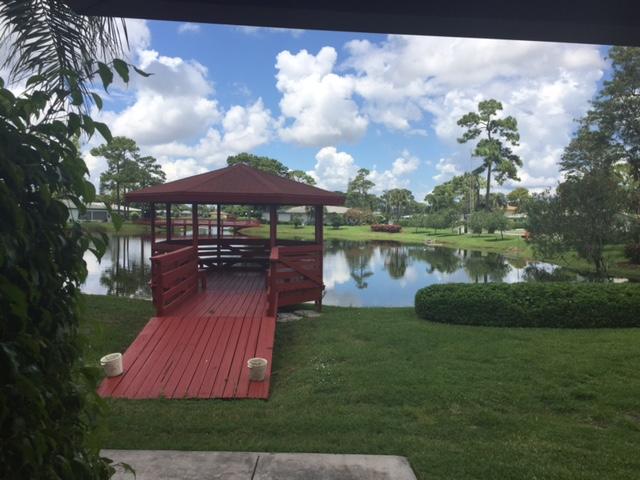 5400 Poppy Place, Unit B Delray Beach, FL 33484 - Photo 19 of 27 Lake & Gazebo by Clubhouse
