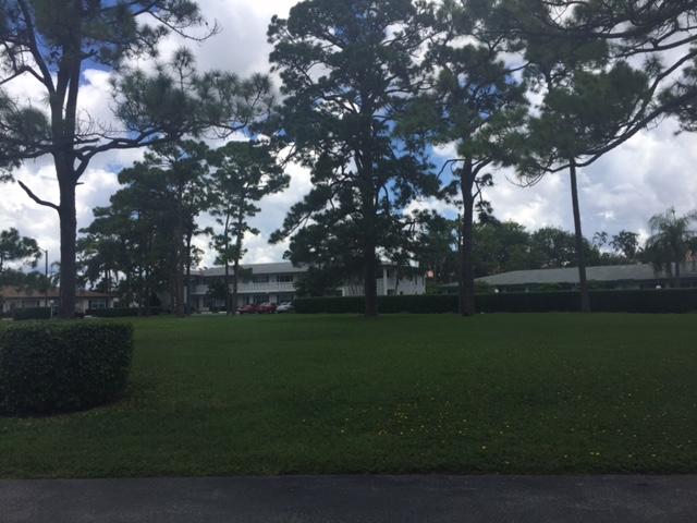 5400 Poppy Place, Unit B Delray Beach, FL 33484 - Photo 20 of 27 Park in front of building