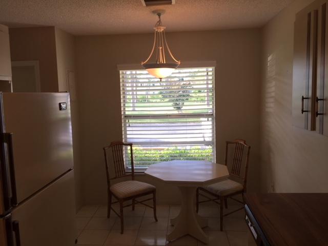 5400 Poppy Place, Unit B Delray Beach, FL 33484 - Photo 9 of 27 Kitchen eat in