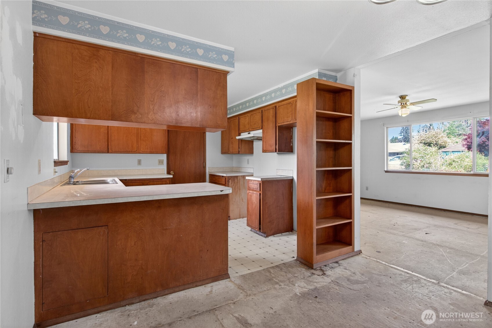 716 Murphy Way Sultan, WA 98294 - Photo 17 of 31 a kitchen with stainless steel appliances a stove and a refrigerator
