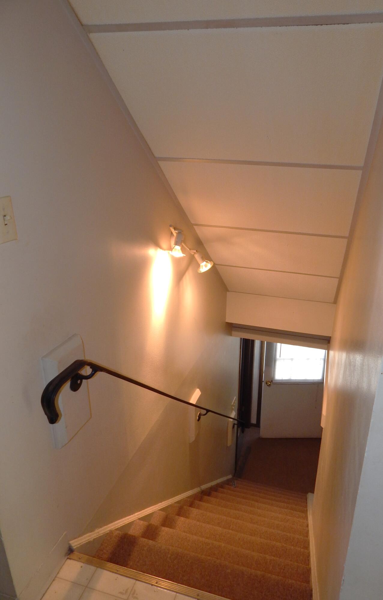 2711 31st Street Two Rivers, WI 54241 - Photo 21 of 23 Stair case from ground floor to upper living area