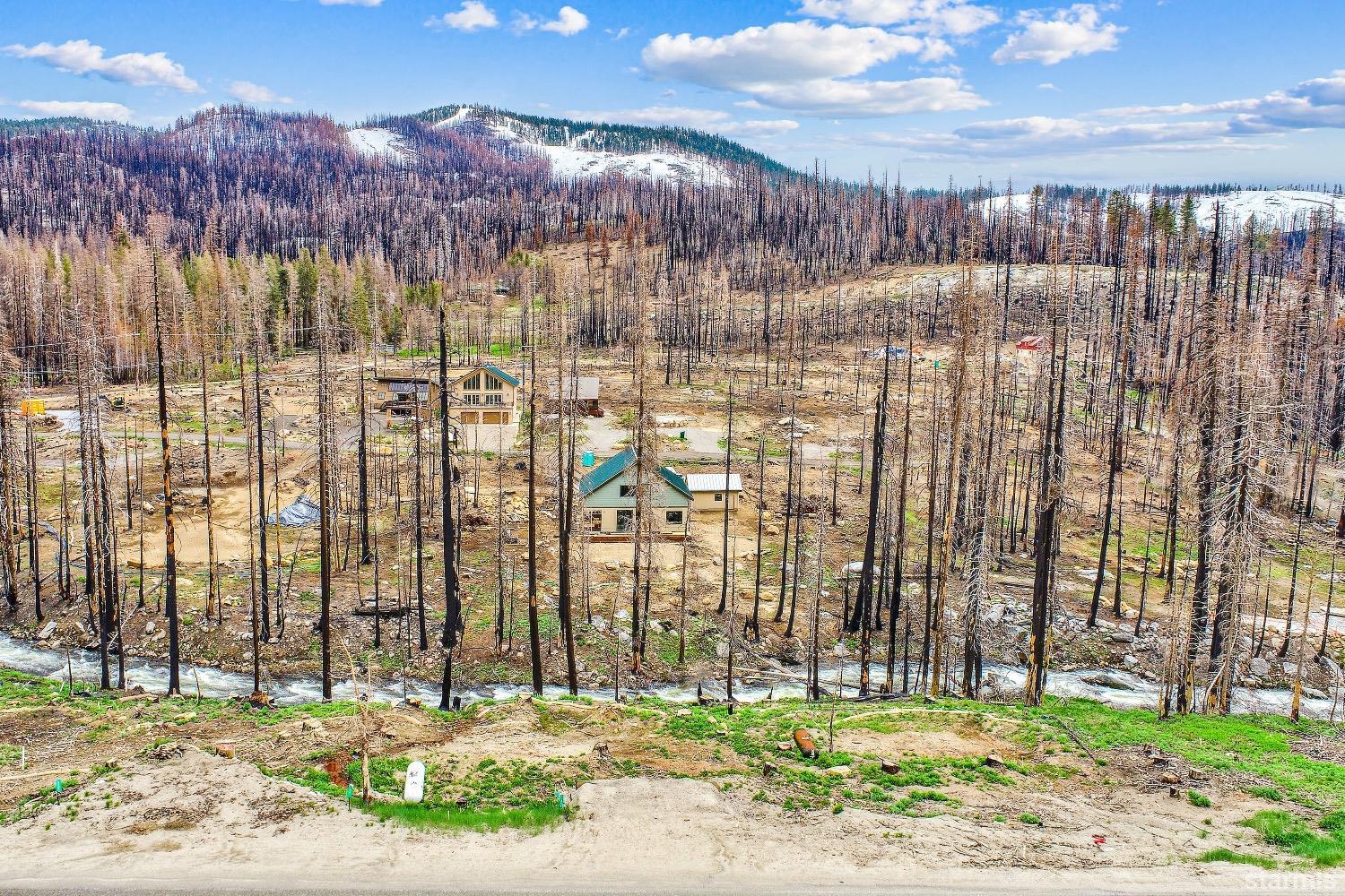 19852 Highway 50 Twin Bridges, CA 95735 - Photo 15 of 16 a front view of a building with a garden