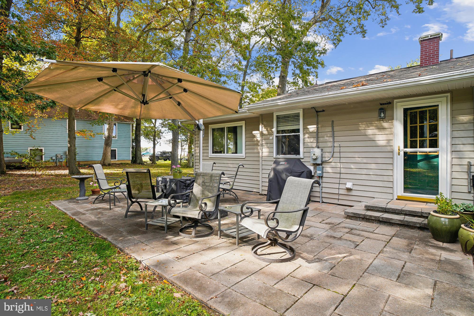 119 Kentmorr Road Stevensville, MD 21666 - Photo 11 of 25 a view of a chairs and table in the patio