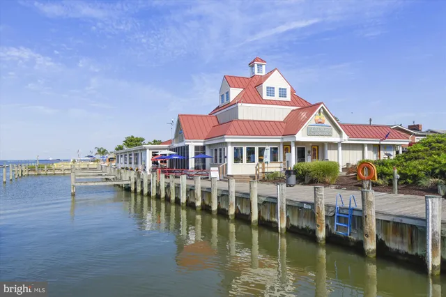 a view of pool with outdoor seating