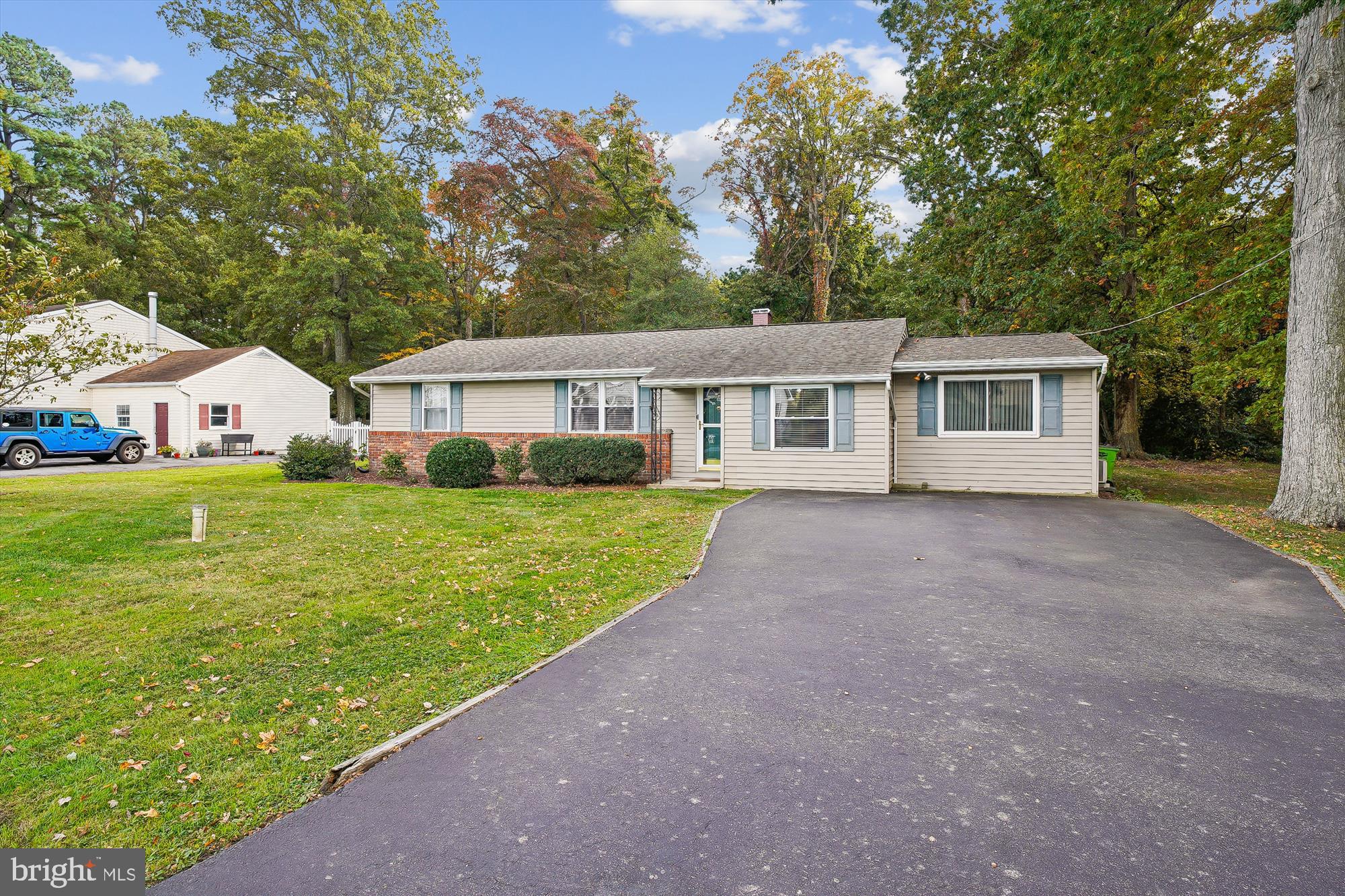 119 Kentmorr Road Stevensville, MD 21666 - Photo 2 of 25 a view of house with yard and trees in the background