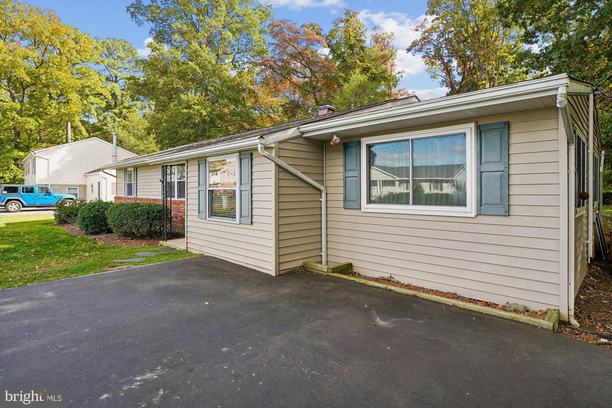 119 Kentmorr Road Stevensville, MD 21666 - Photo 5 of 25 a view of a house with a yard and garage