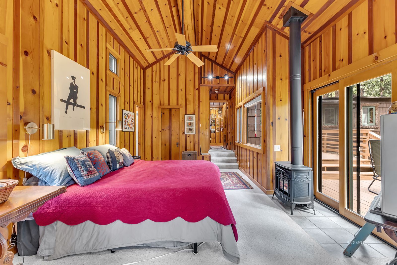 25100 Indian Rock Road Idyllwild, CA 92549 - Photo 37 of 75 a bedroom with a bed and wooden floor