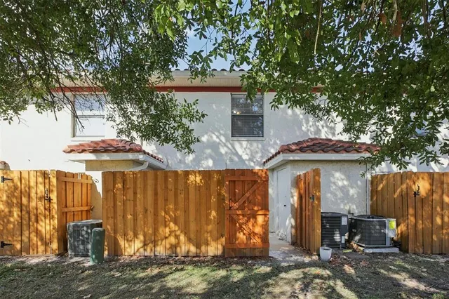 a front view of house with an outdoor seating