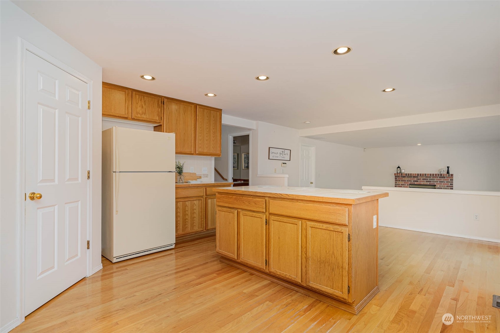14539 144th Place Southeast Renton, WA 98059 - Photo 13 of 37 a kitchen with stainless steel appliances a refrigerator and a stove top oven