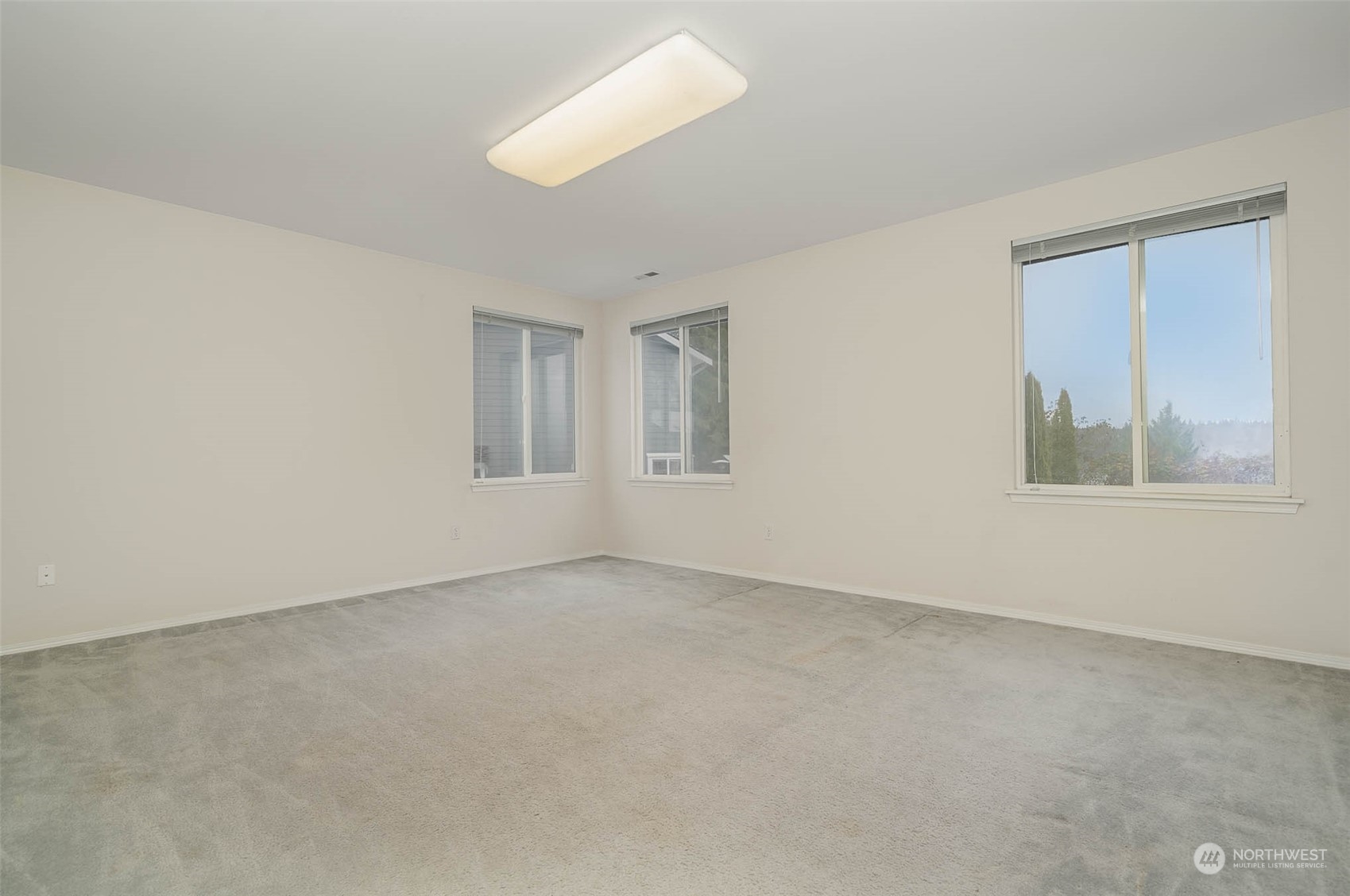 14539 144th Place Southeast Renton, WA 98059 - Photo 27 of 37 a view of an empty room with a window
