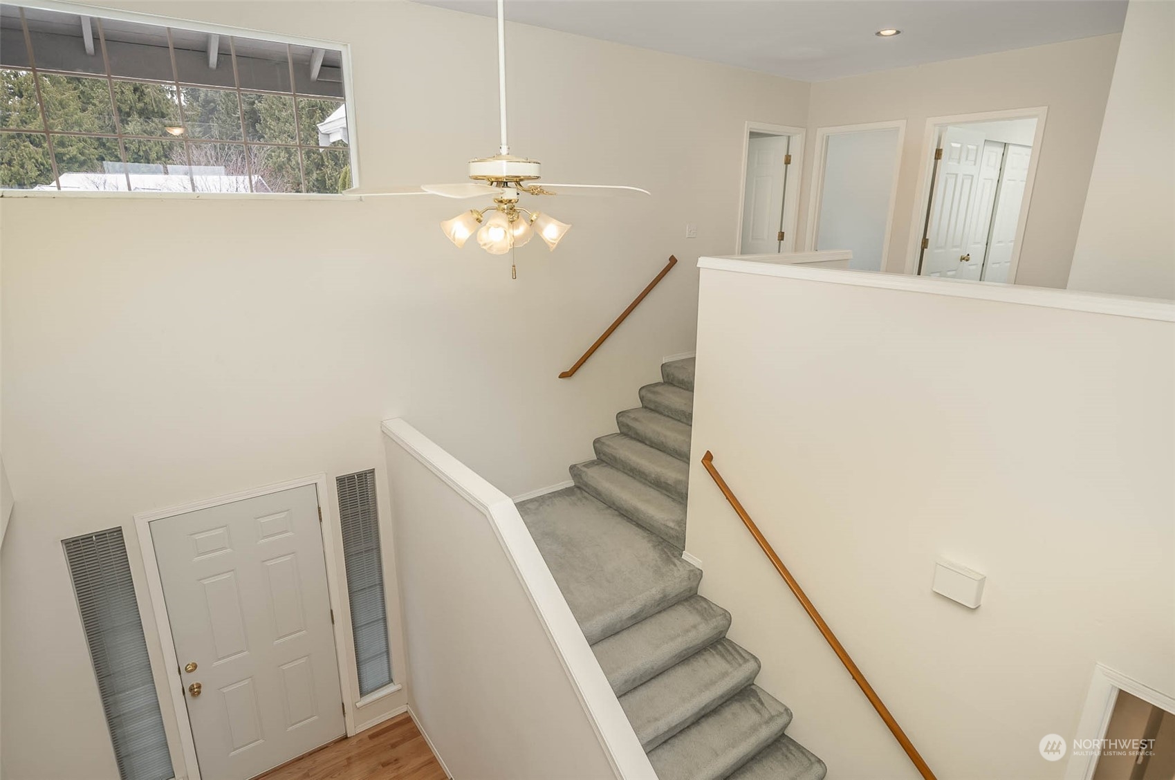 14539 144th Place Southeast Renton, WA 98059 - Photo 34 of 37 a view of entryway and hall with wooden floor
