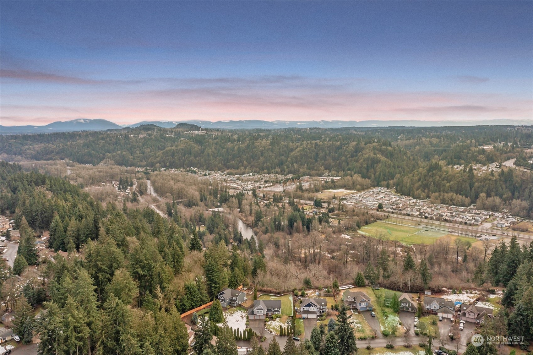 14539 144th Place Southeast Renton, WA 98059 - Photo 6 of 37 a view of a lake with mountains in the background