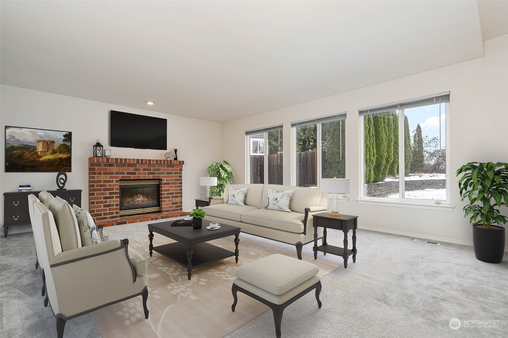 14539 144th Place Southeast Renton, WA 98059 - Photo 8 of 37 a living room with furniture a flat screen tv and a fireplace