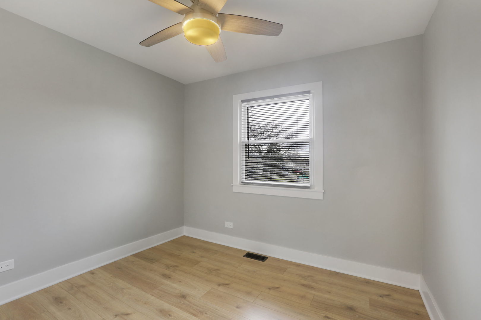 4506 Harbor Circle Hoffman Estates, IL 60192 - Photo 14 of 28 an empty room with a window