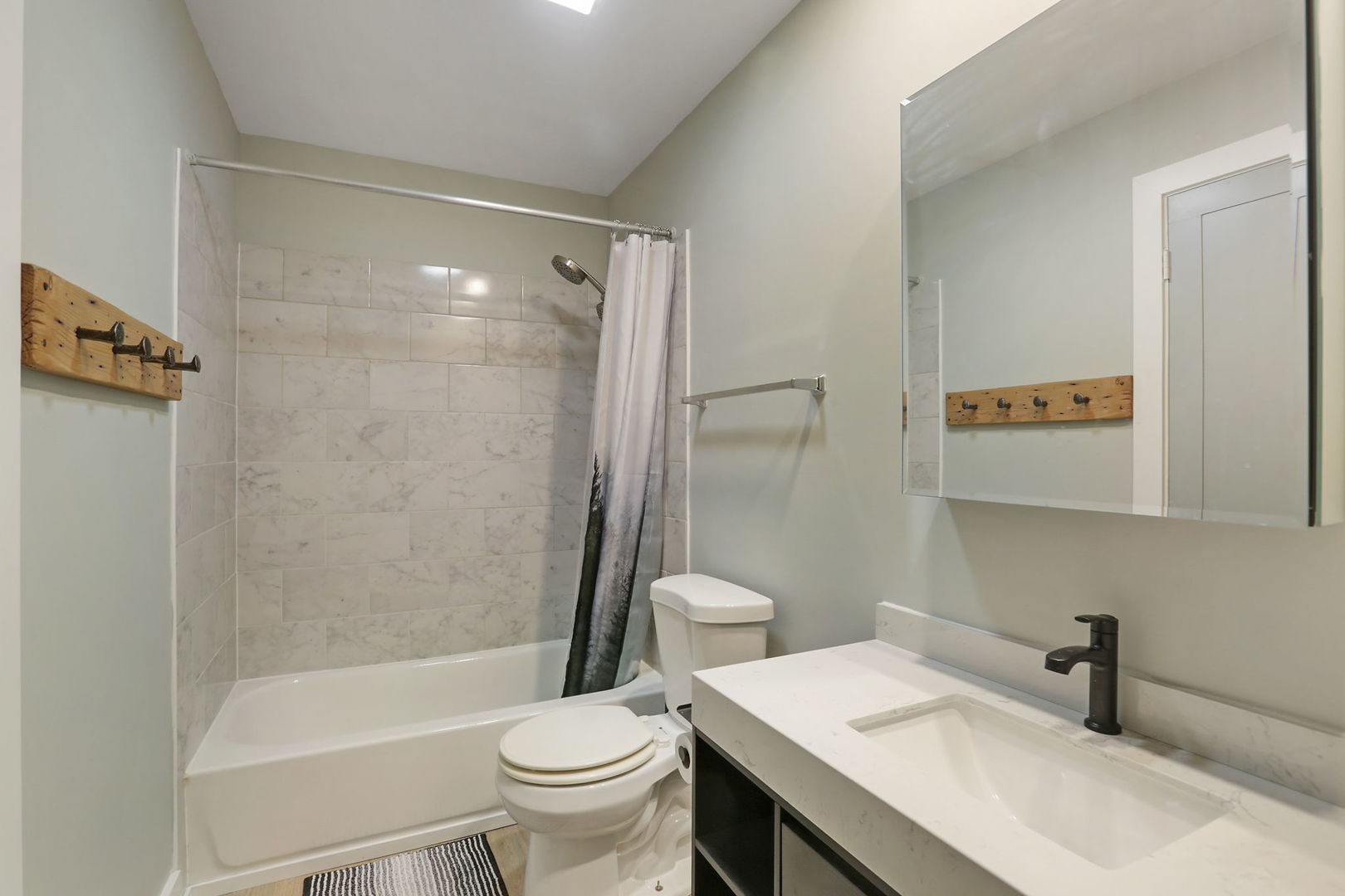 4506 Harbor Circle Hoffman Estates, IL 60192 - Photo 17 of 28 a bathroom with a sink toilet and shower