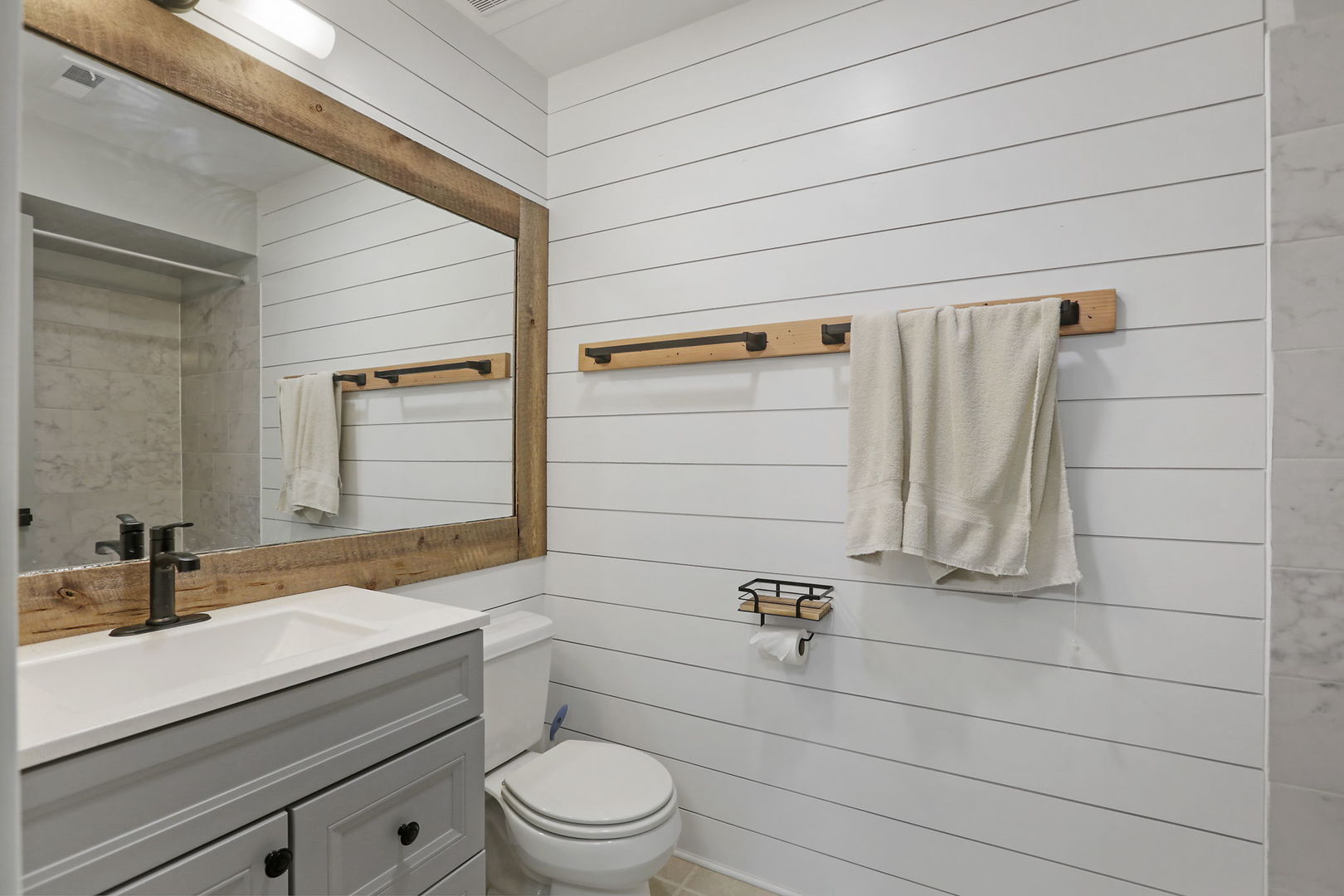 4506 Harbor Circle Hoffman Estates, IL 60192 - Photo 18 of 28 a bathroom with a sink a toilet and shower