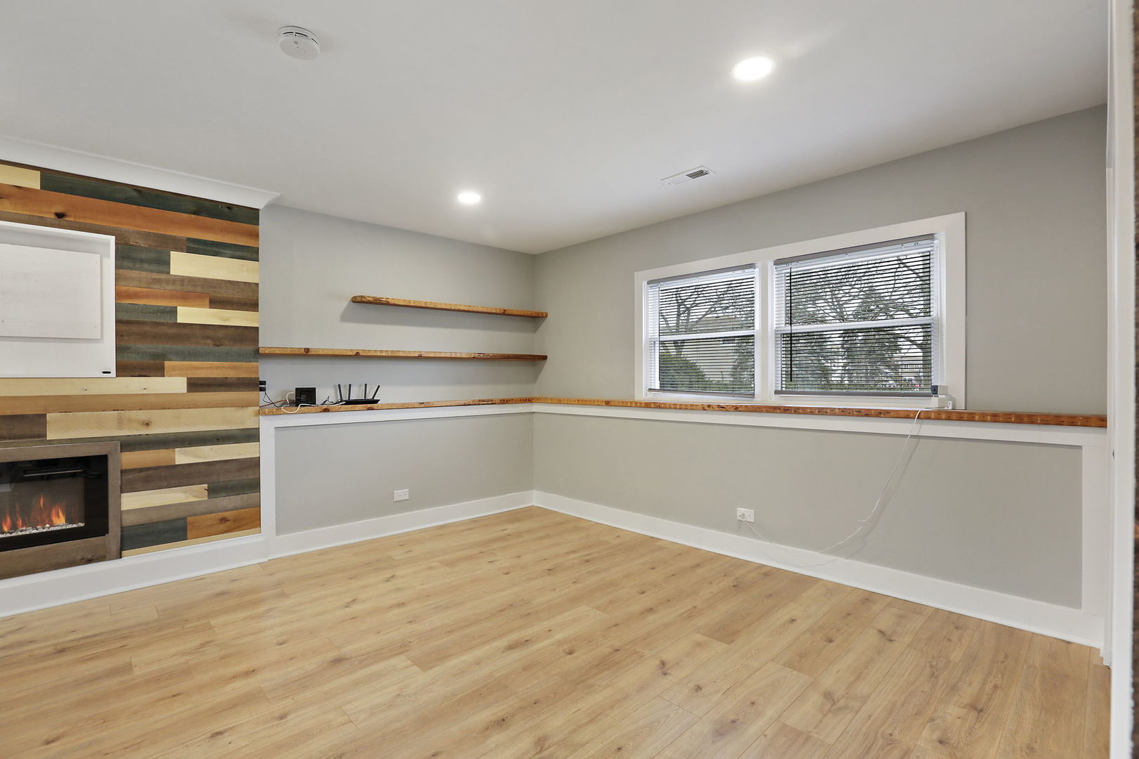 4506 Harbor Circle Hoffman Estates, IL 60192 - Photo 22 of 28 a view of a kitchen with wooden floor and a sink