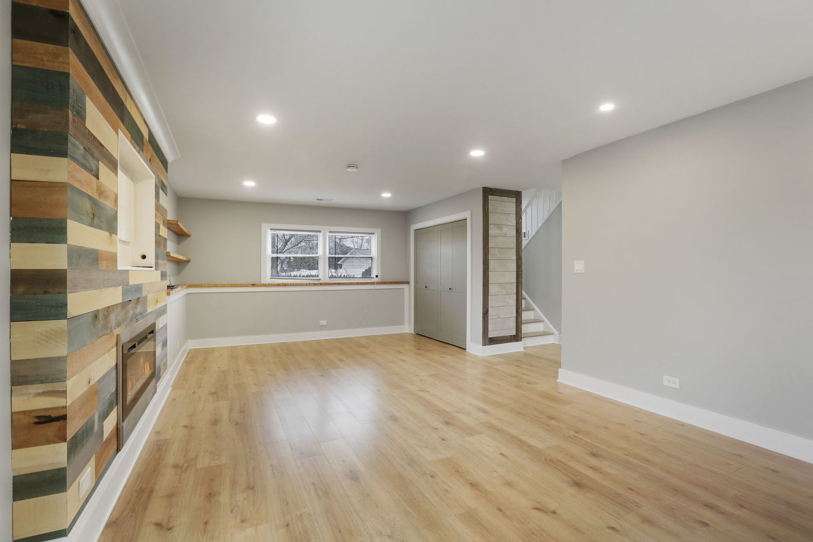 4506 Harbor Circle Hoffman Estates, IL 60192 - Photo 24 of 28 a view of an empty room with wooden floor and a window