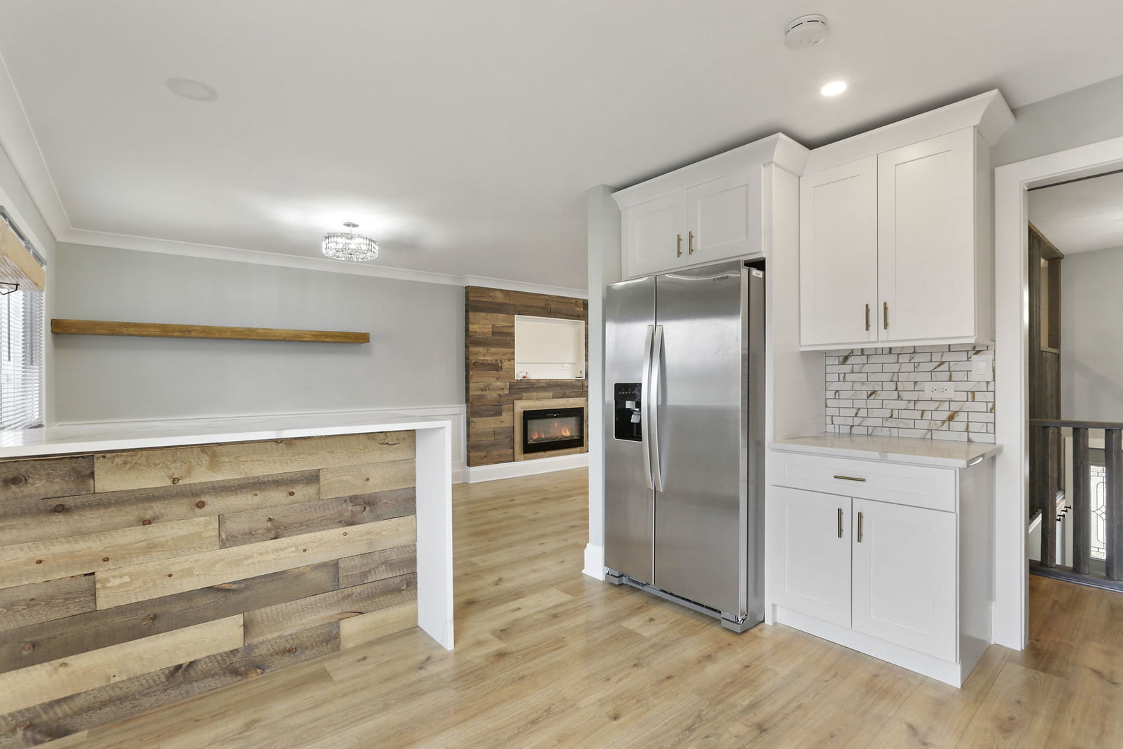 4506 Harbor Circle Hoffman Estates, IL 60192 - Photo 4 of 28 a kitchen with granite countertop a refrigerator and cabinets
