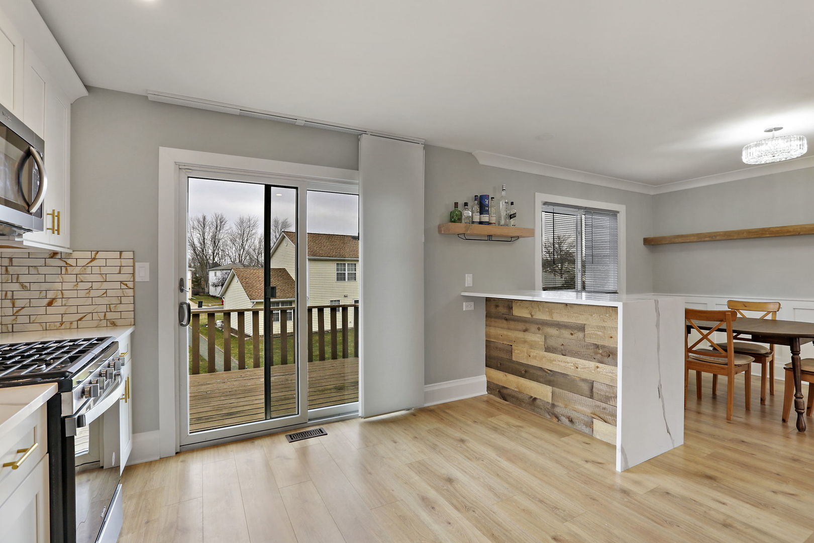 4506 Harbor Circle Hoffman Estates, IL 60192 - Photo 9 of 28 a view of livingroom with furniture wooden floor and window