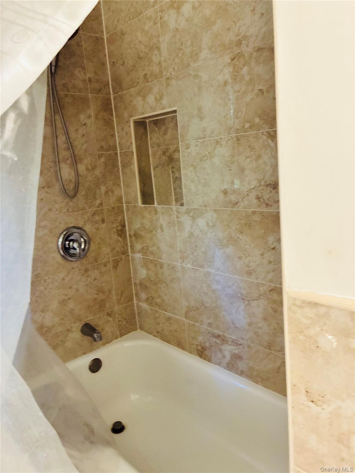 24 Ann Boulevard Spring Valley, NY 10977 - Photo 12 of 25 a bathroom with a shower