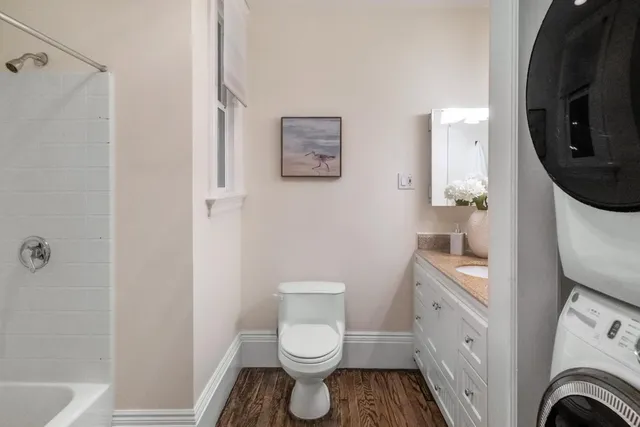 a bathroom with a toilet a sink and a bathtub