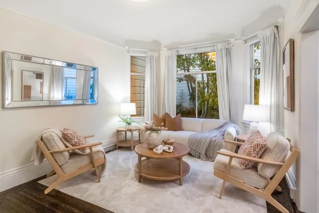 a living room with furniture and window