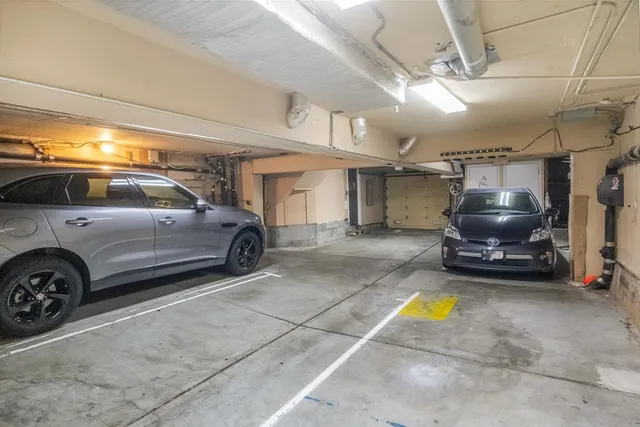 a view of a parking space with a car parked