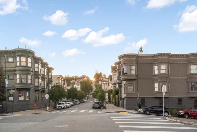a view of a street in front of a building